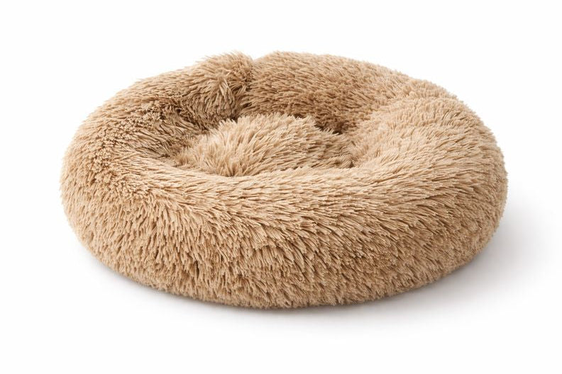 Coussin beige pour chat NUA ultra moelleux en tissu doux, forme ronde enveloppante pour un confort maximal