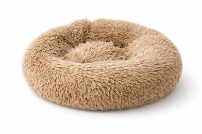 Coussin beige pour chat NUA ultra moelleux en tissu doux, forme ronde enveloppante pour un confort maximal